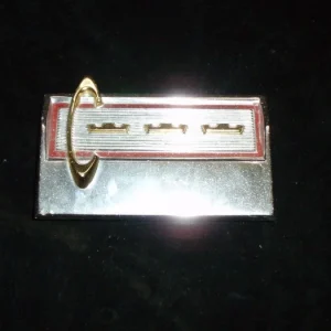 1964 Chrysler grill emblem Billig